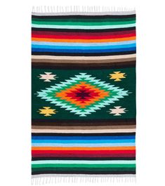 a multicolored blanket with fringes on it