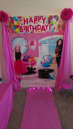 a birthday party with pink decor and decorations for the girls's room, including two beds