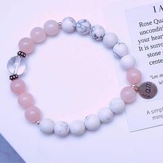 Our "I Am" Bracelet Collection features bracelets that are a simple and powerful reminder to remain mindful and intentional each day in your life. I Am Love: Rose Quartz is the stone of unconditional love, opening your heart to all forms of love. It is surrounded by Howlite the stone of patience, and one center Quartz crystal ball. Affirmation: "Love and compassion are necessities, not luxuries. Without them humanity cannot survive". - Dalai Lama Features: Made with 26 gemstones in Rose Quartz, I Love Life, Howlite Crystal, Rose Quartz Bracelet, Calming Stones, Crystal Rose, Romantic Roses, Dalai Lama, Bracelet Collection, Love Bracelets