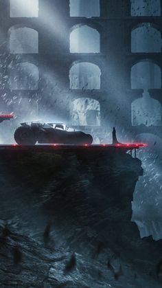 an image of a car in the middle of a dark tunnel with red lights coming from it