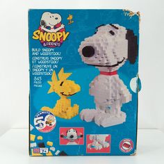 a box with a lego dog in it