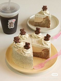 two slices of cake with white frosting and teddy bears on top