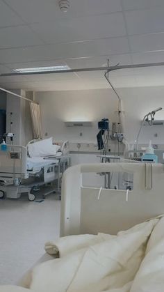 a hospital room filled with lots of medical equipment