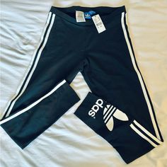 93% Cotton, 7% Spandex Adidas Gym Pants With Three Stripes, Adidas Activewear With Three Stripes For Spring, Adidas Spring Activewear With Three Stripes, Adidas Workout Pants With Three Stripes, Adidas Stretch Sportswear Pants, Adidas Sporty Bottoms With Contrast Stripes, Adidas Three Stripes Pants, Adidas Activewear With Side Stripes For Gym, Adidas Workout Pants With Three Stripes Branding