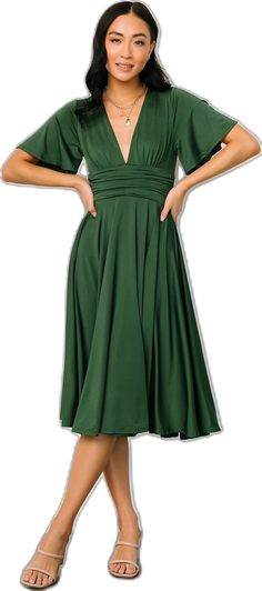 Green Stretch V-neck Dress, Chic Green Fitted V-neck Dress, Elegant Green V-neck Short Sleeve Dress, Fitted Green V-neck Evening Dress, Dark Green V-neck Summer Dress, Green Fitted V-neck Dress With Short Sleeves, Chic Green Flowy V-neck Dress, Green Solid Color Evening Dress, Green V-neck Fit And Flare Dress