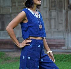 "Blue Indigo Tie Dye Sleeveless Top for Women 100% Double gauze cotton. Indigo natural dye with tie-dye detail on the side. Sizing: Made in one size to fits XS to M / US: 2/4/6/8 Measurement; Chest up to 37'' Pit to pit across 19'' Length top to bottom 15\" Armhole 18'' around. **Model is a size US 6 with 33\"bust 36\" hip. 164 cm tall.** Description: 100% Double Gauze cotton. Very soft and comfy. Indigo natural dye. With tie-dye detail on the sides. Simple round neck with a small slid in the mi Indigo Sleeveless Top For Spring, Sleeveless Indigo Tops For Spring, Sleeveless Cotton Tops With Natural Dye, Sleeveless Cotton Top With Natural Dye, Washed Blue Cotton Sleeveless Tank Top, Sleeveless Washed Blue Cotton Tank Top, Blue Cotton Tank Top For Summer, Casual Sleeveless Top With Natural Dye, Casual Sleeveless Eco-friendly Top