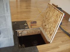 an open hole in the floor that is being worked on