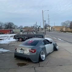 the car is parked on the side of the road