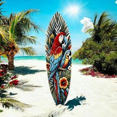 a painting of two parrots on a surfboard in the sand near palm trees