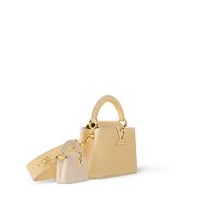 LOUIS VUITTON® - Capucines Mini - Banana Yellow Gold Top Handle Bag For Everyday Use, Designer Yellow Gold Shoulder Bag For Everyday Use, Designer Yellow Gold Rectangular Bag, Yellow Gold Rectangular Bag With Detachable Strap, Luxury Yellow Gold Rectangular Bag, Luxury Yellow Gold Rectangular Bags, Yellow Gold Rectangular Travel Bag, Designer Yellow Gold Bags For Everyday Luxury, Luxury Yellow Gold Top Handle Bag