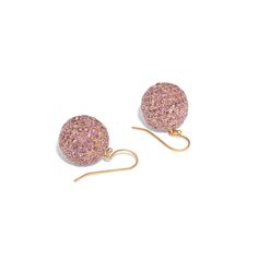 The Story A stunning pair of dangle earrings made during the late 20th century. Filled to the brim with 374 pink sapphires in the most beautiful color, all pave set they create a uniform look. Each earrings has 187 sapphires ranging in size from 3 mm down to 2 mm each. Set in 14 karat rose gold, the pink of these earrings is outstanding. When worn, the balls dance and move giving them an incredible amount of sparkle and shine. Measuring 1.12 inches in length, they hang on 14k rose gold hooks. Go Luxury Pink Round Earrings, Dazzling Sparkling Pink Jewelry, Luxury Pink Sapphire Earrings, Luxury Pink Pierced Earrings, Elegant Rose Gold Earrings With Pink Sapphire, Elegant Rose Gold Pink Sapphire Earrings, Pink Sparkling Stone Round Earrings, Pink Round Fine Jewelry Earrings, Round Earrings With Pave Setting For Party