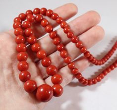 -Antique 8k Gold Natural Red Coral Beaded Necklace -Total length: 22.75 in -Bead size: 3.7 mm ~ 13 mm -Bead on clasp size: 5.5 mm -Total weight: 33.5 g -Marked 333 & JKa -Have some hairline cracks Elegant Red Coral Jewelry With 8mm Beads, Classic Formal Beads, Red Round Beads Necklace For Formal Occasions, Red Single Strand Jewelry For Formal Occasions, Formal Red Coral Beaded Necklace, Classic Red Beaded Necklace As Gift, Classic Round Beads For Formal Occasions, Classic Red Beaded Necklace For Gift, Formal Red Single Strand Jewelry