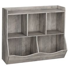 the bookcase is made from wood and has four compartments