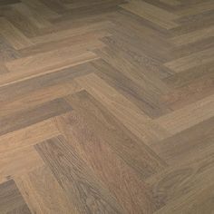 an image of wood flooring that looks like herringbones