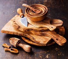 wooden utensils and spoons on a cutting board