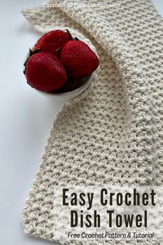 a crochet dish towel with strawberries in it