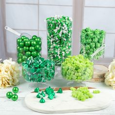 green and white candies are arranged on a table