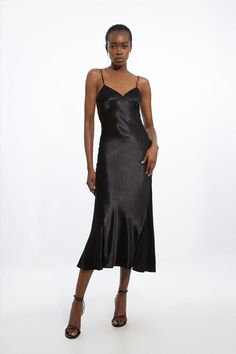 Turn Heads In Our Slip Dress, Featuring A Relaxed Silhouette That Skims The Curves, A Strappy Back, And A Sleek, Clean Design That Will Draw Eyes Wherever You Head. Styles Well With Strappy Heels For A Statement Occasion Look, Perfect For Wedding Guest Days And Formal Events. Viscose Satin Topstitch Detail Woven Slip Dress High Quality, Smooth Satin Fabric Figure Skimming Silhouette Sweetheart Neckline V Back Design Feminine Floaty Skirt Statement Strappy Back Tie Back Fastening Black Satin Slip Dress Outfit, Slip Dress Outfit Night, Satin Slip Dress Outfit, Black Slip Dress Outfit, Black Satin Slip Dress, Petite Wedding Guest Dresses, Slip Dress Outfit, Draw Eyes, Petite Business Casual