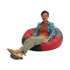 a man sitting on a bean bag chair