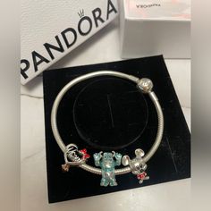 Brand New, Never Worn. Gorgeous Brand New Pandora Charm Bracelet With 3 Disney Charms Perfect Gift For Mom. Will Also Consider Selling Charms Individually, Just Ask! Comes In Beautiful Pandora Box With Logo Tissue Wrap. Pandora Moments Snake Charm Bracelet In Silver - $65 Minnie Mouse Mom Heart Charm - $65 Mickey Mouse Red Trousers Charm - $65 Disney Pixar Sulley Charm - $75 Total Value Of Bracelet $270 Images Of Individual Pieces From Pandora’s Website. Pandora Disney Charms, New Pandora Charms, Pandora Charms Disney, Girly Bracelets, Pandora Bracelet Designs, Red Trousers, Disney Charms, Pandora Disney, Bracelet In Silver