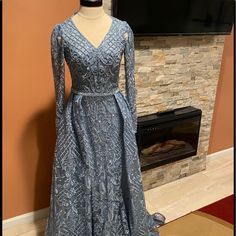 Blue Long Gown With Over Skirt And Beading Size 4 Elegant Light Blue Gown For Reception, Elegant Light Blue Dress For Reception, Embellished Blue Evening Dress For Reception, Blue Embellished Evening Dress For Reception, Blue Long Gown, Over Skirt, Long Gown, Beading, Color Blue