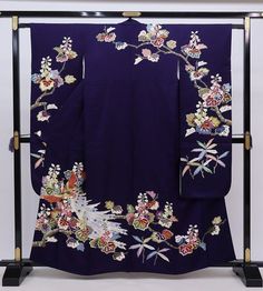 This striking silk Furisode Kimono is covered in floral.  A vintage Japanese long sleeved dress with extra long length for trailing on the ground when you walk. Wear this Kimono dress for your special event, or hang  it as a display to enjoy everyday. Item: Furisode Silk Kimono No. frn193 Size: US  M-L   /  Length 62.5 inches (159cm), Width 25.5 inch (65cm). Condition: Used, Vintage, Good. Please check the photos. Need a KIMONO RACK to hang this kimono?  Find it here: https://www.etsy.com/listin Vintage Silk Kimono For Wedding, Floral Print Long Sleeve Kimono For Wedding, Long Sleeve Floral Print Kimono For Wedding, Long Sleeve Floral Kimono For Wedding, Long Sleeve Floral Print Wedding Kimono, Blue Silk Kimono For Wedding, Long Floral Embroidered Kimono For Wedding, Blue Silk Wedding Kimono, Traditional Wedding Kimono With Floral Embroidery