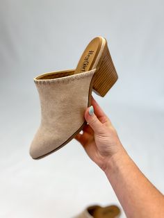 Step out in style with [Corky's] Sizzle Mule-Sand Faux Suede! These elegant heeled mules feature a cushioned footbed for all-day comfort, a pointed toe for a sophisticated touch, and embroidered details for added elegance. The light, neutral hue makes them perfect for any occasion. Key Features: Sand Faux Suede 3 inch Heel Slide on mule Corkys does not make half sizes, so if you are in between sizes, we recommend sizing up to the next whole size in order to ensure a proper fit. 3 Inch Heels, Embroidered Details, Slide On, Stepping Out, Mules Shoes, The Light, Mule, Heeled Mules, Faux Suede