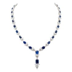 Finely crafted in 18K white gold featuring pear- and trillion-cut diamonds weighing a total of approximately 26.00 carats and oval cushion-cut sapphires weighing a total of approximately 32.00 carats. Circa 1960s-70s. Drop Necklace Gold, Gold Drop Necklace, Diamond Drop Necklace, The Bling Ring, Necklace Emerald, Blue Sapphire Necklace, Diamond Necklace Designs, Boot Jewelry, Harry Winston