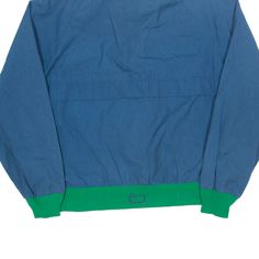 Item is in good used condition. >Size: L >Armpit To Armpit: 24" >Armpit To Cuff: 19" >Collar To Hem: 25" Blue Casual Track Jacket For Outdoor, Casual Blue Windbreaker For Streetwear, Retro Blue Long-sleeve Windbreaker, Retro Blue Long Sleeve Windbreaker, Retro Blue Windbreaker For Streetwear, Blue Retro Windbreaker For Streetwear, 90s Style Blue Windbreaker With Pockets, 90s Blue Windbreaker With Pockets, 90s Blue Windbreaker For Streetwear