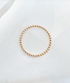 Wear one or many! These amazing stackers add the perfect dainty detailing to any outfit. Details: +Sterling Silver or Gold Fill options +Small bead-like details around entire band +1.5mm width Religious Rings, Christian Rings, Dainty Rings, Beaded Ring, Gorgeous Jewelry, Beaded Rings, Dainty Ring, Outfit Details, Earring Necklace