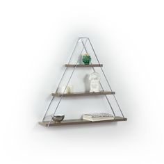 three tiered shelf with glass shelves on each side and a white vase sitting on top