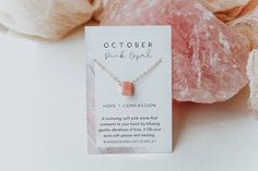 Our dainty Pink Opal Necklace is part of our new Birthstone Necklace Collection! This beautiful, yet delicate necklace is made with top-quality, genuine Pink Opal. The October Birthstone represents hope + compassion. The Pink Opal stone is emerald cut and faceted to ensure it sparkles from every angle. This beauty is perfect to gift to someone special, or treat yourself! It deserves to be worn every day. ----------------------FEATURES◊ Genuine Pink Opal stone (measures 7mm x 9mm)◊ Choice of yell Delicate Crystal Necklace As Gift, Dainty Crystal Necklaces For Gifts, Dainty Crystal Necklace For Gift, Dainty Rose Gold Crystal Necklace As Gift, Dainty Rose Gold Crystal Necklace For Gift, Pink Opal Ring, October Birthstone Necklace, October Birthday, Chain Extenders