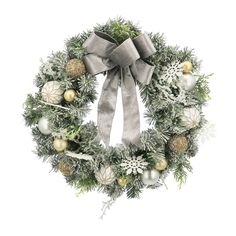 a christmas wreath with silver and gold ornaments on it's side, tied in a bow