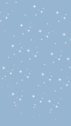 the sky is filled with white stars on a light blue background that looks like snow flakes