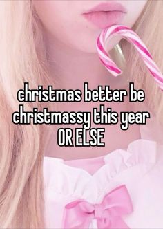 a girl holding a candy cane with the words christmas better be christmas this year or else