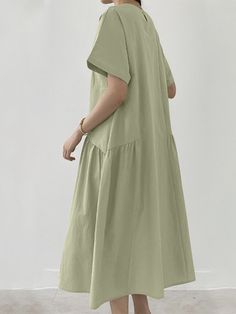 Leisure Solid Ruched Short Sleeve Round Neck Maxi Dress Casual Cotton Pleated Maxi Dress, Casual Solid Color Pleated Maxi Dress, Casual Solid Pleated Maxi Dress, Casual Solid Color Maxi Dress With Relaxed Fit, Casual Relaxed Fit Solid Color Maxi Dress, Casual Solid Maxi Dress For Spring, Casual Pleated Cotton Midi Dress, Casual Pleated Maxi Dress For Daywear, Casual Cotton Maxi Dress With Ruffle Hem