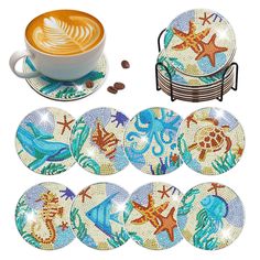 six coasters with different designs on them and a cup of coffee in the middle