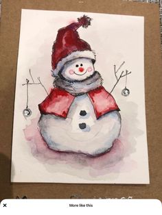 a watercolor painting of a snowman wearing a red hat and scarf