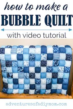 a blue and white quilt sitting on top of a wooden bench with text overlay that reads how to make a bubble quilt