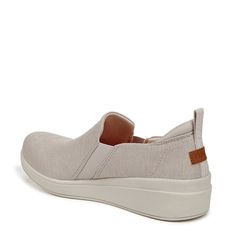 Just slip on and go in these casual, incredibly lightweight womens slip-on sneakers. Spring Flat Slip-on Sneakers With Arch Support, Casual Slip-on Sneakers With Removable Insole For Walking, Sporty Canvas Slip-on Sneakers, Comfortable Slip-on Sneakers With Removable Insole For Everyday, Spring Flat Slip-on Sneakers With Ortholite Insole, Beige Slip-on Sneakers For Everyday, Synthetic Walking Shoes For Light Exercise In Spring, Spring Sneakers With Arch Support For Light Exercise, Comfortable Slip-ons For Walking In Spring