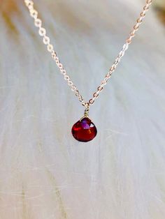 Looks like a blood drop, faceted teardrop shaped, dainty minimalist natural garnet, wire wrapped pendant necklace, solid sterling silver 16 inches long chain. Sterling silver chain is 1 mm in width. Pendant: natural deep dark red garnet, size approximately 10 mm (stone by itself: 6 mm). Bloodstone Necklace, Chrysoprase Ring, Blood Drop, Lapis Lazuli Pendant, Garnet Pendant, Wrapped Pendant, Red Garnet, Wire Wrapped Pendant, Long Chain