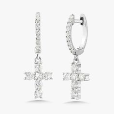 Our Adalia Cross Huggies are a twinkling token of faith. An ideal pair of huggies to dress up, down, or wear daily. Metal: 18k White Gold / 18k Yellow Gold / 18k Rose Gold Approx. 0.62 ctw G/H Color and SI1-2 Clarity Diamonds Cross size 7.45mm width x 9.5mm height Huggie Diameter: Approx. 10mm Closure: Hinge Diamond Halo Huggie Earrings, Luxury Hallmarked White Gold Huggie Earrings, Diamond Huggie Earrings With Halo, Luxury White Gold Huggie Earrings With Halo Design, Luxury Halo Huggie Earrings, White Diamond Cut Huggie Earrings, White Gold Huggie Earrings With Halo For Wedding, White Gold Halo Huggie Earrings For Wedding, White Huggie Earrings With Brilliant Cut