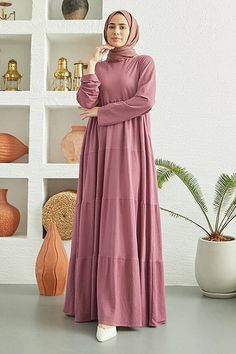 This pleated maxi dress combines modest elegance with versatility. Crafted from lightweight, breathable mixed fabric, it features tiered pleats that drape gracefully, making it a suitable choice for any season and an ideal option for warm spring days. The dress is beautifully crafted so that it looks great on all body types. Length and Fabric Content: Available Size: 38 - 40 - 42 - 44-46 Dimensions of the Product Model: Size: 38 cm Height: 144 cm Bust: 112cm Waist: 148cm Hips: 152 cm Special Not Ribbed Jacket, Peach Puff, Red Peach, Maxi Dress Sale, Warm Spring, Pleated Maxi Dress, Pleated Maxi, Tiered Maxi Dress, Spring Day