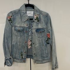 Classic Denim Jacket With Floral Embroidery. Never Worn. Trendy Floral Embroidered Denim Jacket For Spring, Trendy Denim Floral Print Outerwear, Spring Denim Jacket With Floral Print, Trendy Denim Jacket With Floral Print, Trendy Floral Print Denim Jacket, Spring Denim Outerwear With Multicolor Embroidery, Fitted Spring Denim Jacket With Multicolor Embroidery, Spring Cotton Denim Jacket With Embroidered Patch, Spring Outerwear With Embroidered Patch