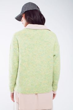 Introducing our Green Fluffy Knit Sweater with a Stylish V-Neck – a soft and comfortable addition to your everyday wardrobe, perfect for daily wear.   Key Features:     Material:  Crafted from a blend of 70% Polyester, 21% Polyamide, 8% Wool, and 1% Elastane, this sweater offers a fluffy and cozy knit.   V-Neck Design:  The V-neck adds a touch of style and versatility to this sweater, making it suitable for various occasions.   Ribbed Details:  The ribbing at the bottom, cuffs, and collar enhances the sweater's look while adding comfort.   Regular Fit:  Designed for a regular fit, it ensures both comfort and style for your daily wear.   Full Length:  This sweater is perfect for everyday use, providing warmth and softness.   Fit:  Model is wearing size U. Model is: 33-24-35 Height: 5'8.   T Casual Chunky Knit V-neck Sweater For Layering, Relaxed Fit Knit V-neck Sweater For Layering, Casual V-neck Cardigan With Soft Texture, Trendy Knitted V-neck Sweater For Layering, Cozy Relaxed Fit V-neck Sweater For Layering, Cozy Soft Knit V-neck Sweater For Layering, Cozy Knit V-neck Sweater For Layering, Casual Soft Knit V-neck Sweater For Spring, Cozy Chunky Knit V-neck Sweater For Layering