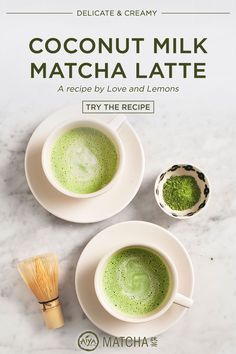 two cups of matcha latte next to a whisk