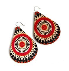 "Colorful mandala dangle earrings!  Perfect for anyone who loves a pop of color and making a statement. The colorful mandala design is screen printed on top of teardrop shape lightweight wood.   They are about 2\" wide and 3\" long.  See photo with hand for an idea of size. You can choose stainless steel hooks or solid sterling hooks. The earrings are water resistant, however it is best to take these earrings off before showering, swimming, or rolling in puddles!   A great gift for that special Colorful Teardrop Jewelry, Red Teardrop Jewelry For Festival, Multicolor Teardrop Earrings For Gift, Multicolor Teardrop Pendant Earrings For Gift, Orange Teardrop Jewelry For Festivals, Multicolor Bohemian Teardrop Earrings For Pierced Ears, Handmade Multicolor Teardrop Earrings For Festival, Red Teardrop Earrings For Festival, Multicolor Bohemian Teardrop Earrings With Ear Wire