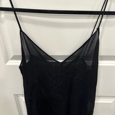 Very Nice For The Beach Or To Throw Over Any Nice Style You Are Wearing. Classy Ladies You Will Love This To Go To The Club Or Any Pool Party Also. Feel Free To Browse My Page For More Exclusive Items Ladies!!! Thanks!!! Black Sheer Spaghetti Strap Top, Sheer Camisole For Summer Nights Out, Black V-neck Camisole For Evening, Black Sheer Sleeveless Camisole, Casual Evening Cami Top, Chic Black Camisole For Date Night, Elegant Summer Evening Tops In Black, Elegant Black Tops For Summer Evenings, Elegant Black Summer Evening Tops