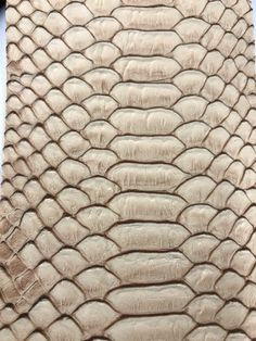 an image of a snake skin pattern on the side of a bag