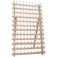 a wooden rack with several rows of pegs attached to the top and bottom sides